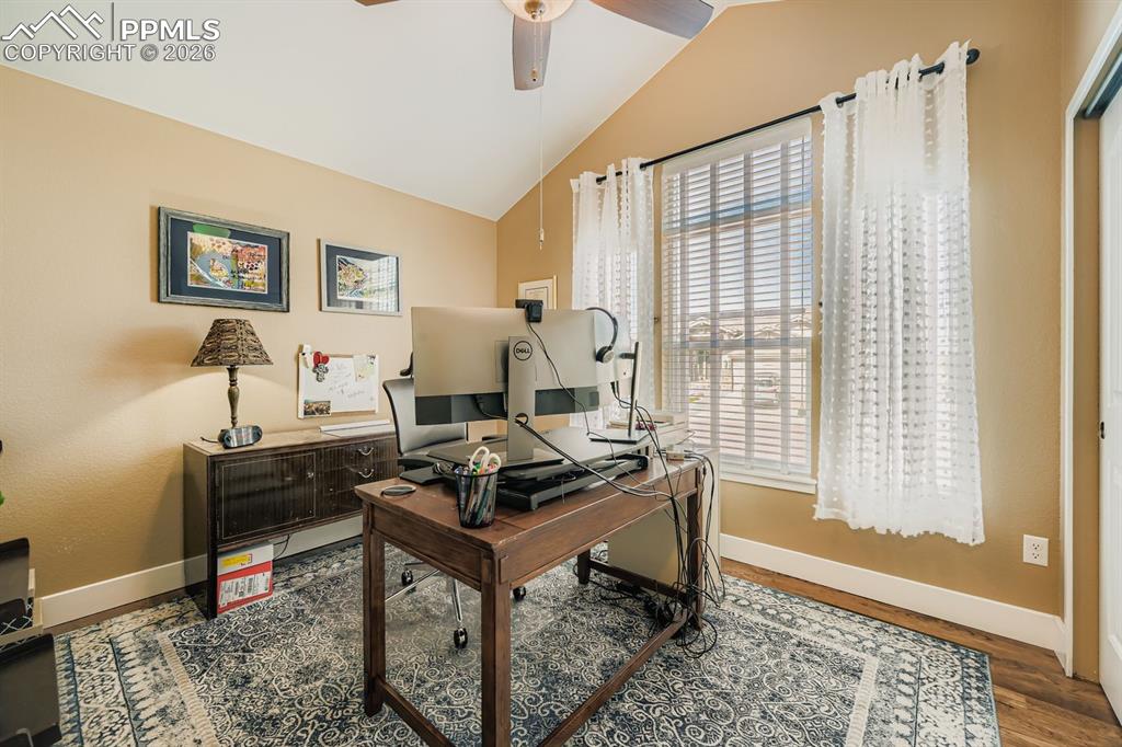 Image 14 of 33: Main level bedroom is great for an office or 4th bedroom