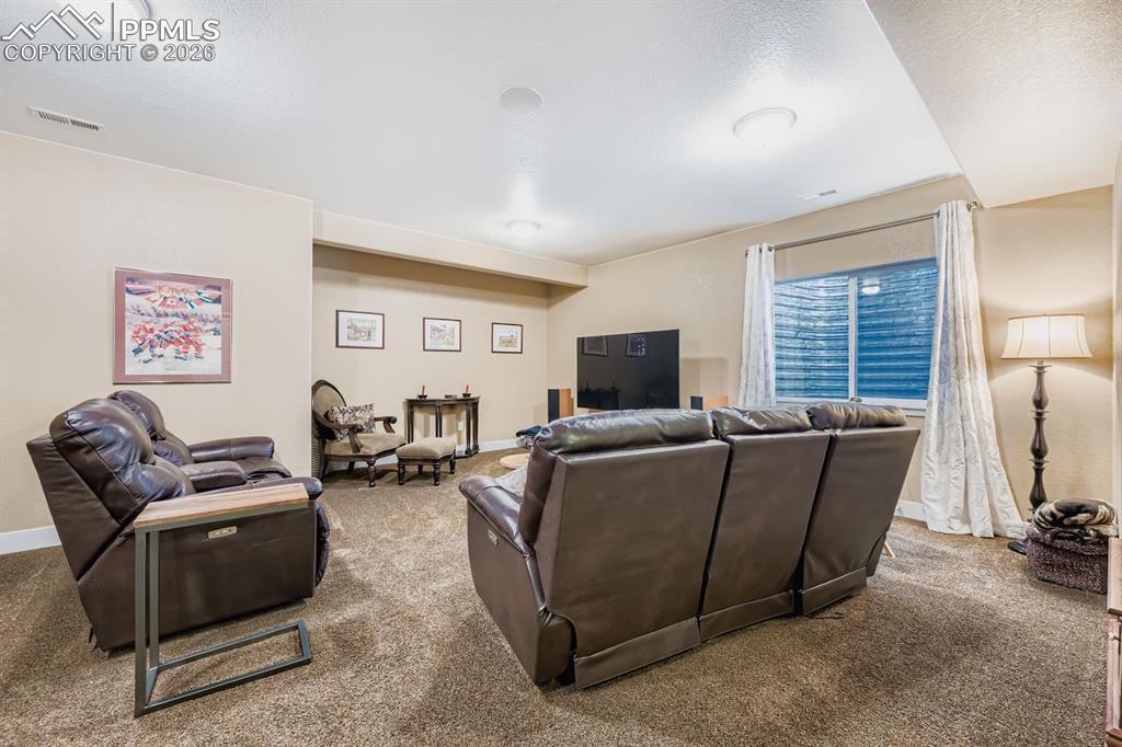 Image 17 of 33: Finished basement with 9+ ceilings and built in speakers