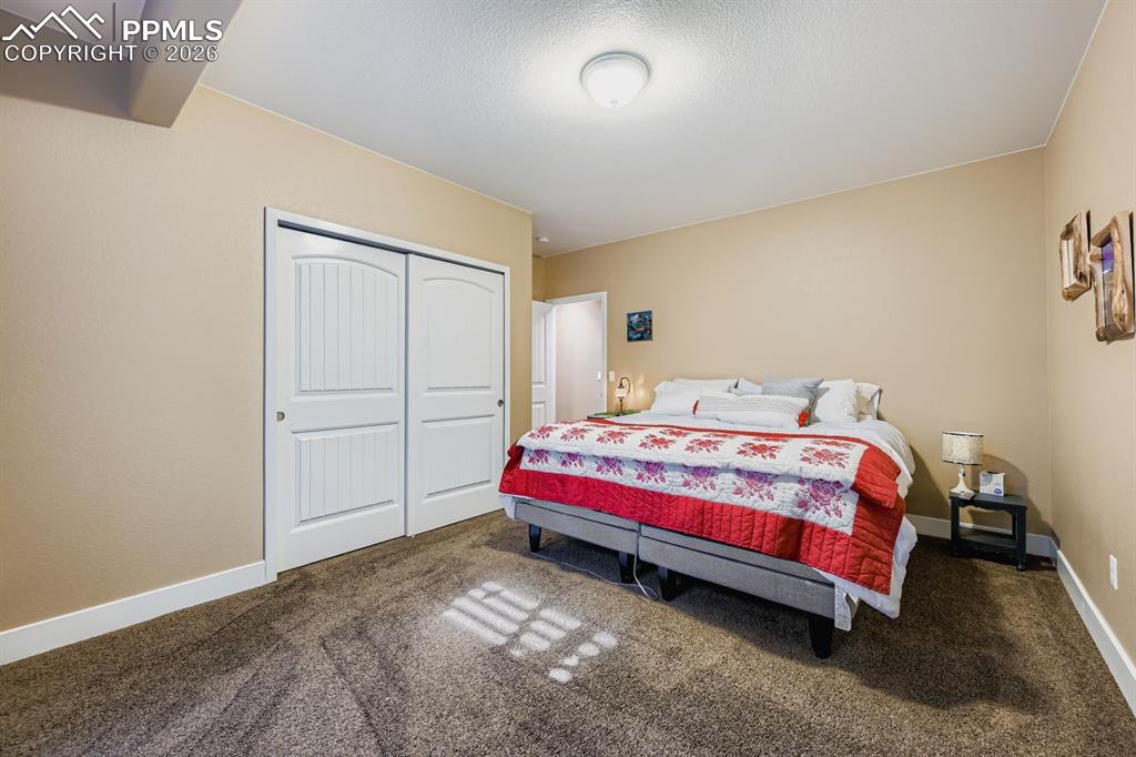 Image 20 of 33: Basement 3rd bedroom