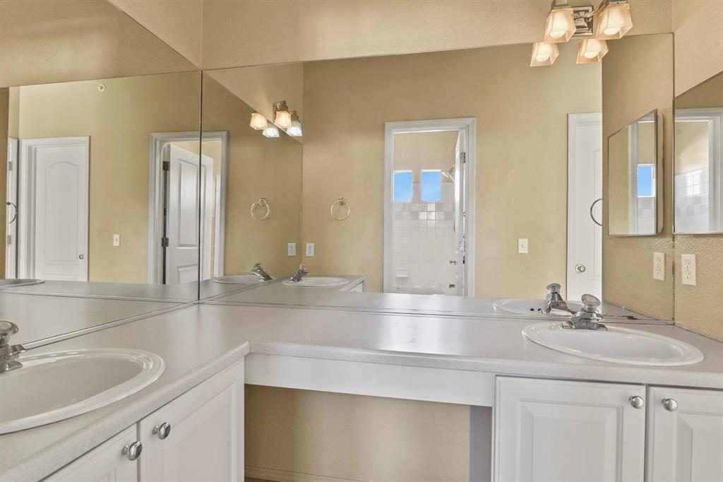 Image 22 of 37: Double vanities