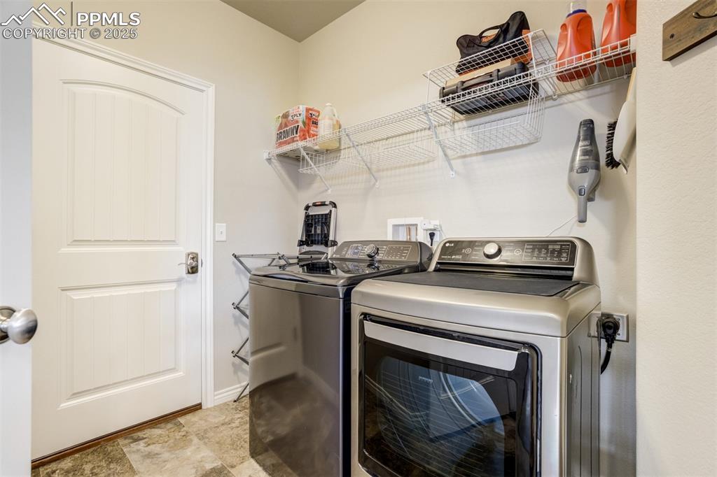 Image 21 of 42: Washer and dryer included