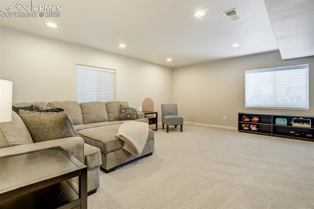 Image 23 of 42: Garden level basement with lots of light