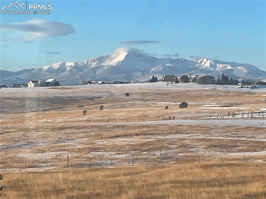 Image 3 of 47: View of mountain from living room background featuring rural landscape