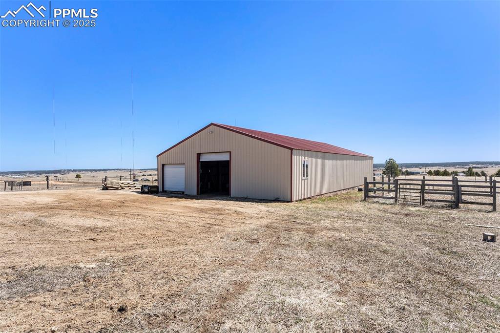 Image 39 of 47: View of pole building featuring a view of countryside