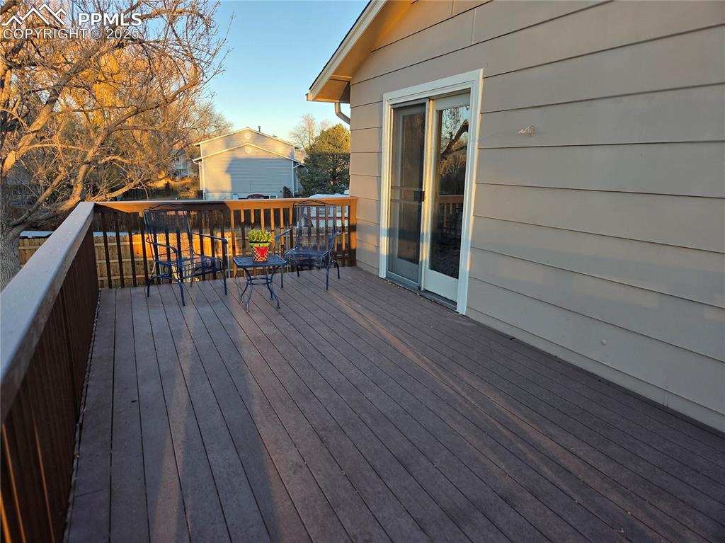 Image 10 of 25: Walkout deck from primary bedroom