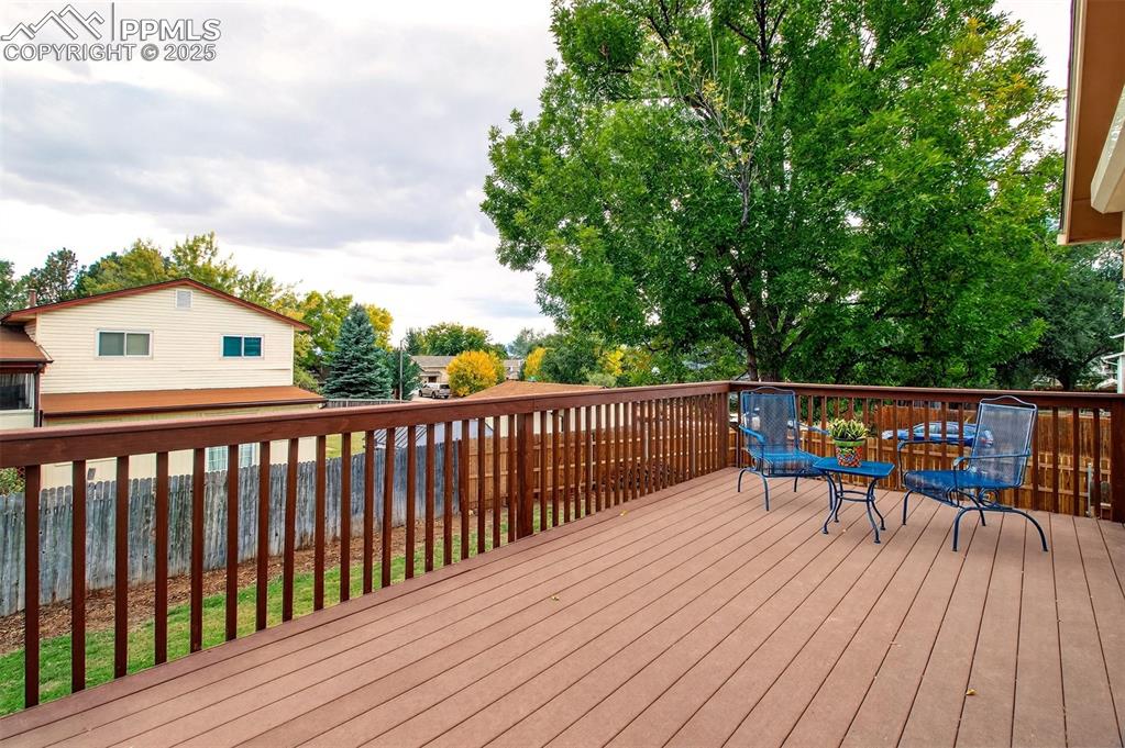 Image 11 of 25: Walkout deck from primary bedroom