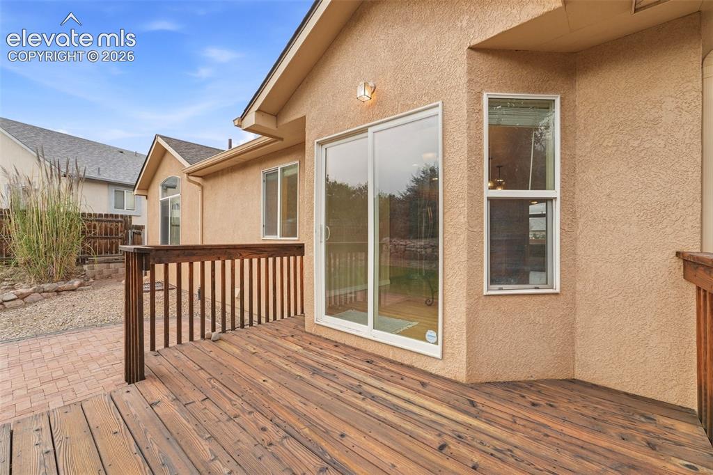 Image 15 of 47: Freshly Stained Back Deck off Dining Area