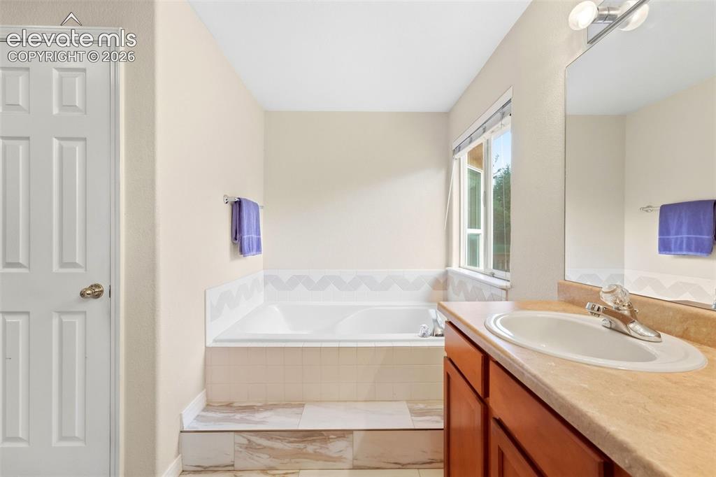 Image 21 of 47: Primary Bathroom with Large Soaking Tub