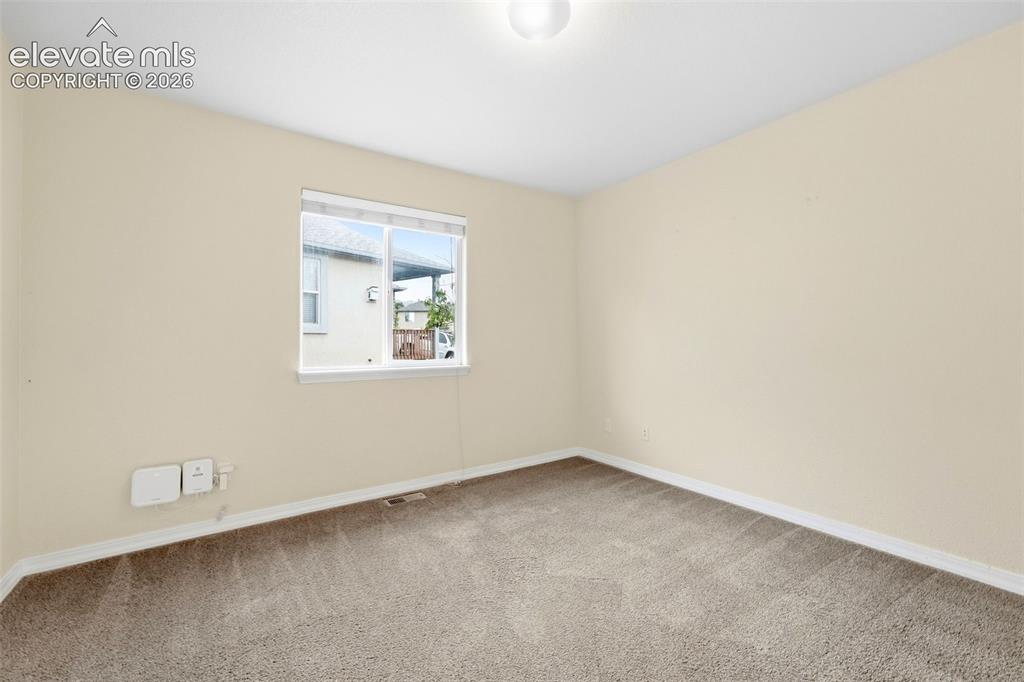 Image 25 of 47: Main Level Bedroom, Great Functional Office Space