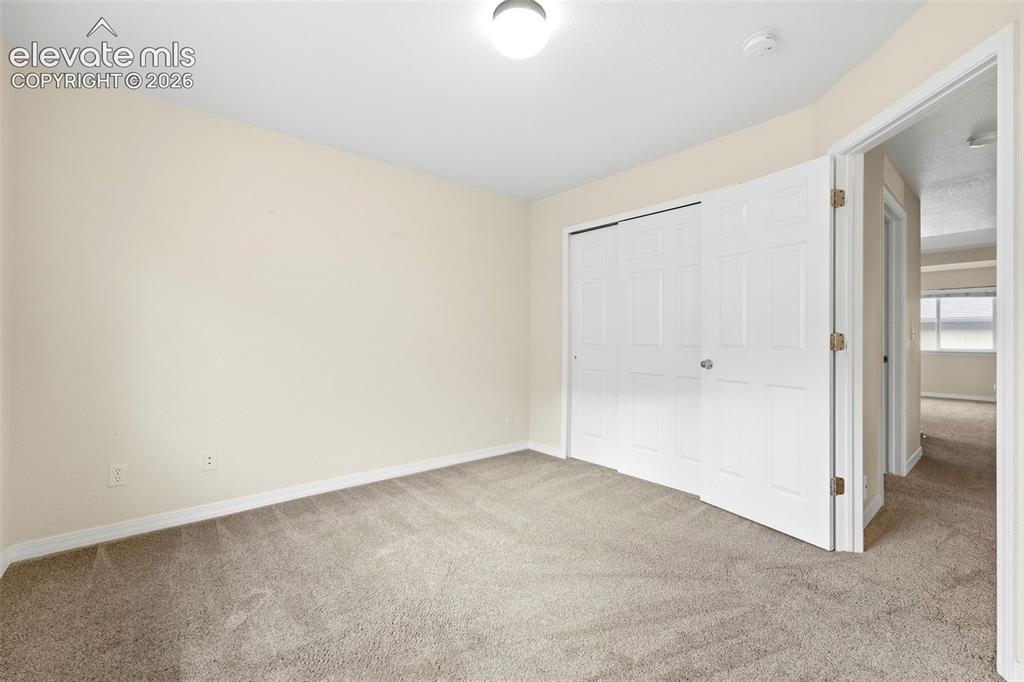 Image 26 of 47: Main Level Bedroom with Closet Space