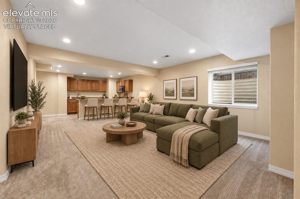 Image 29 of 47: Virtually Staged Family Room in Basement