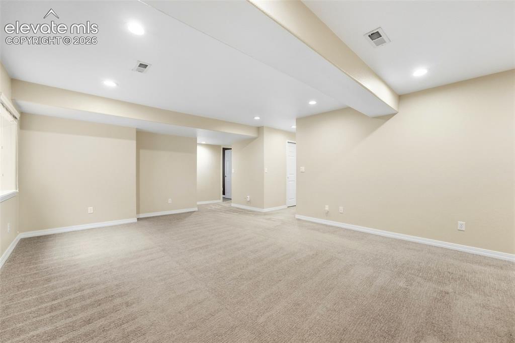 Image 35 of 47: Flexible Family Room Space in Basement
