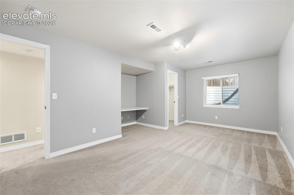 Image 37 of 47: Bedroom 3 in Basement features Walk In Closet