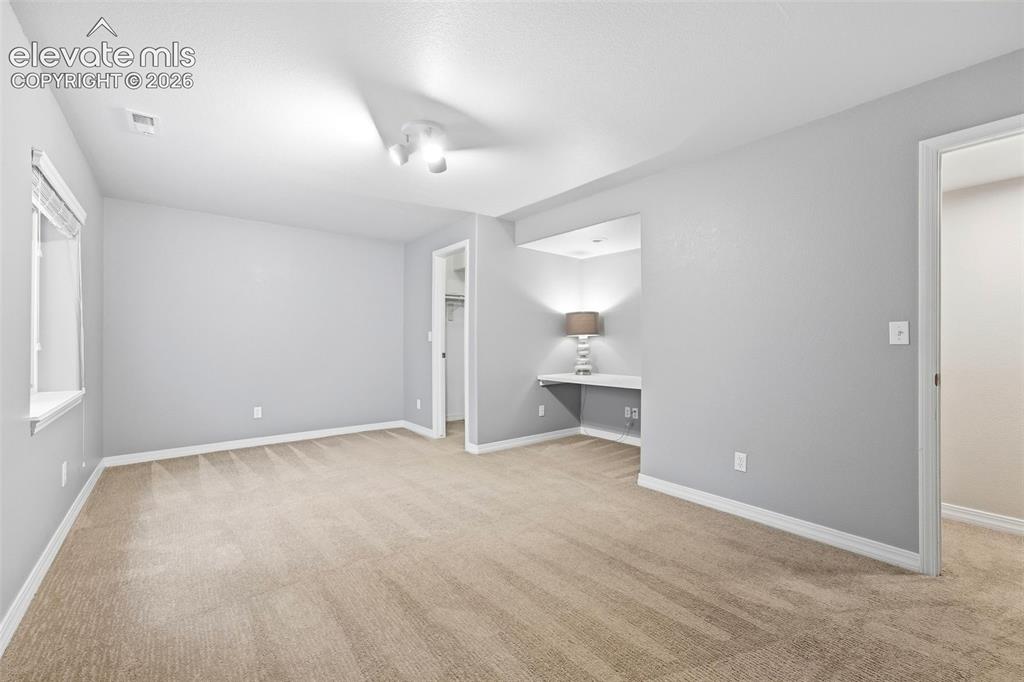 Image 39 of 47: Bedroom 4 in Basement features Walk In Closet