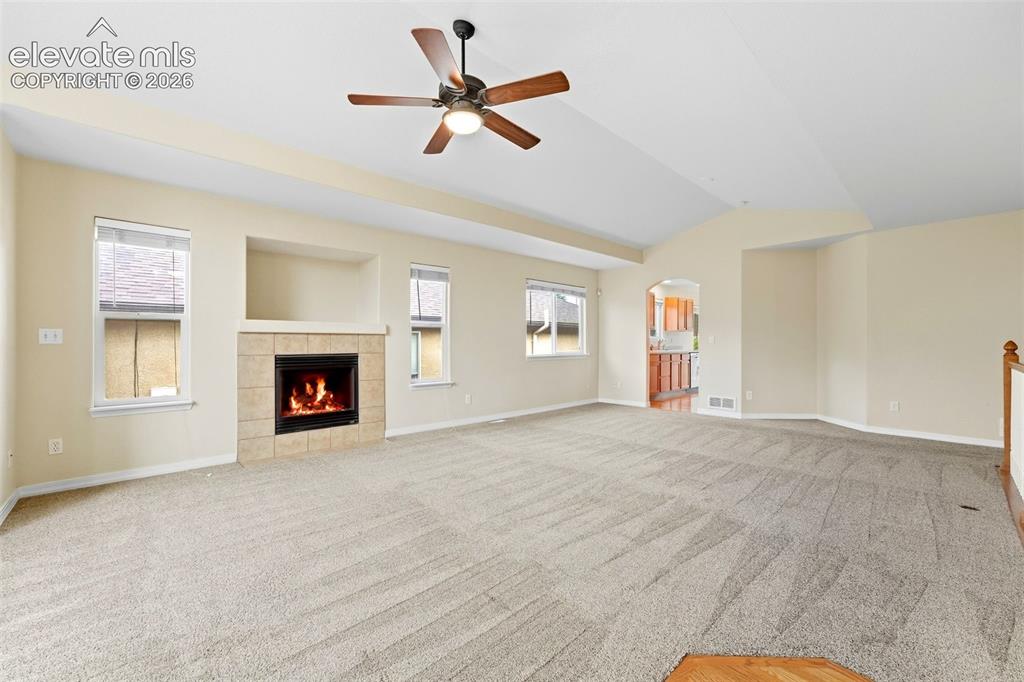 Image 4 of 47: Large Formal Living Room with Built In above Gas Fireplace