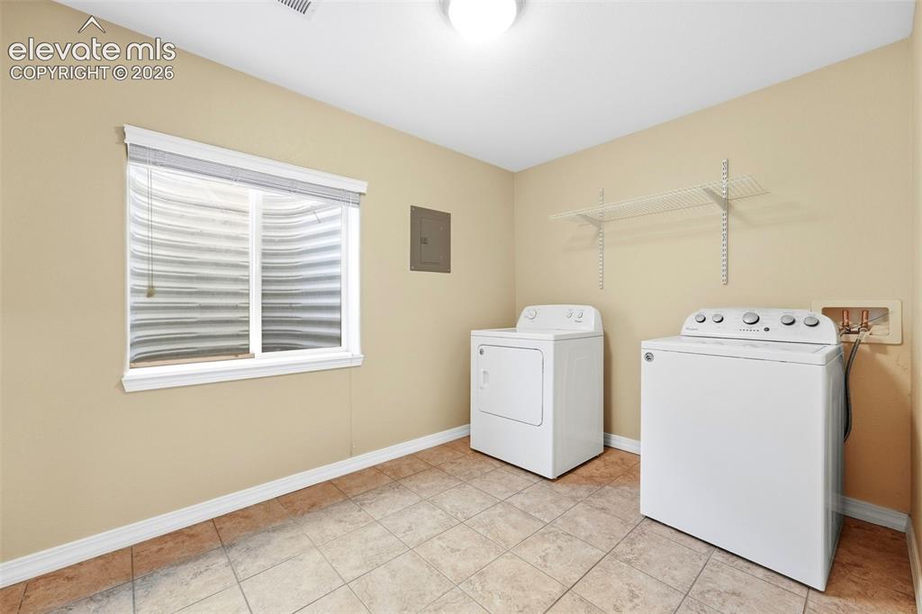 Image 42 of 47: Large Laundry Room in Basement with Stub for Sink