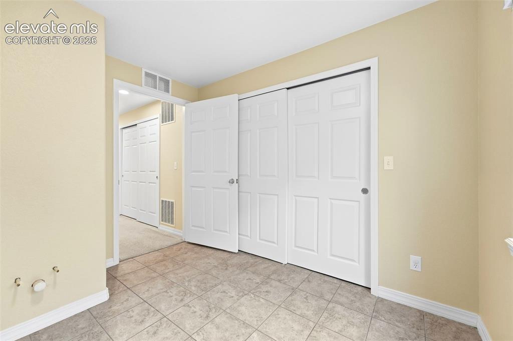 Image 43 of 47: Laundry in Basement includes Large Closet for Additional Storage