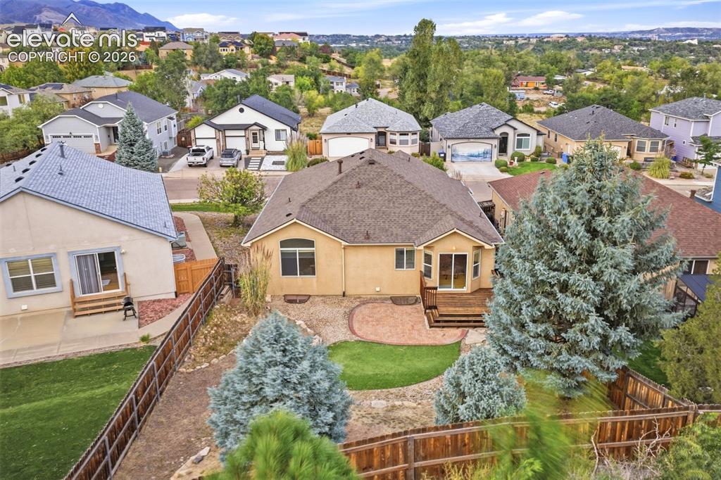 Image 46 of 47: Gorgeous Aerial Picture of Backyard with Mountains in View