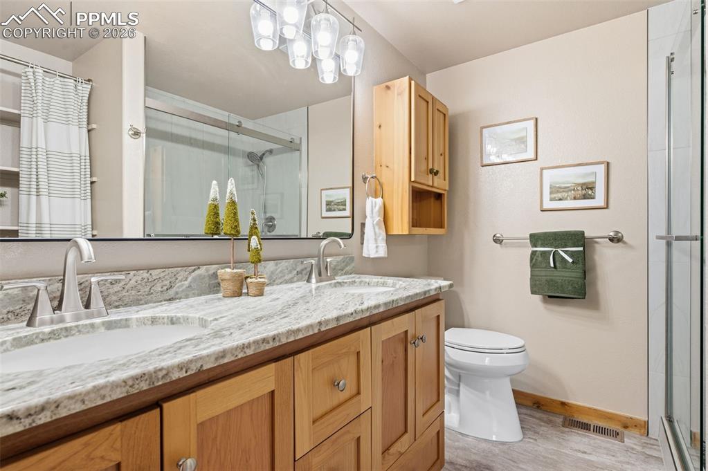 Image 17 of 41: Main level newly remodeld primary bathroom