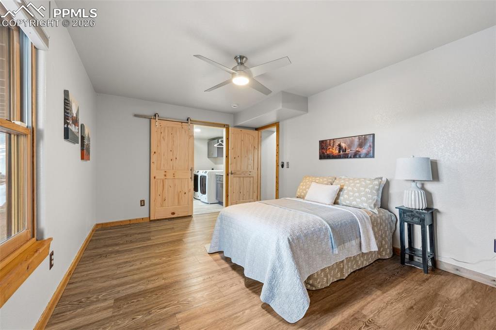 Image 25 of 41: Basement bedroom with access to bathroom