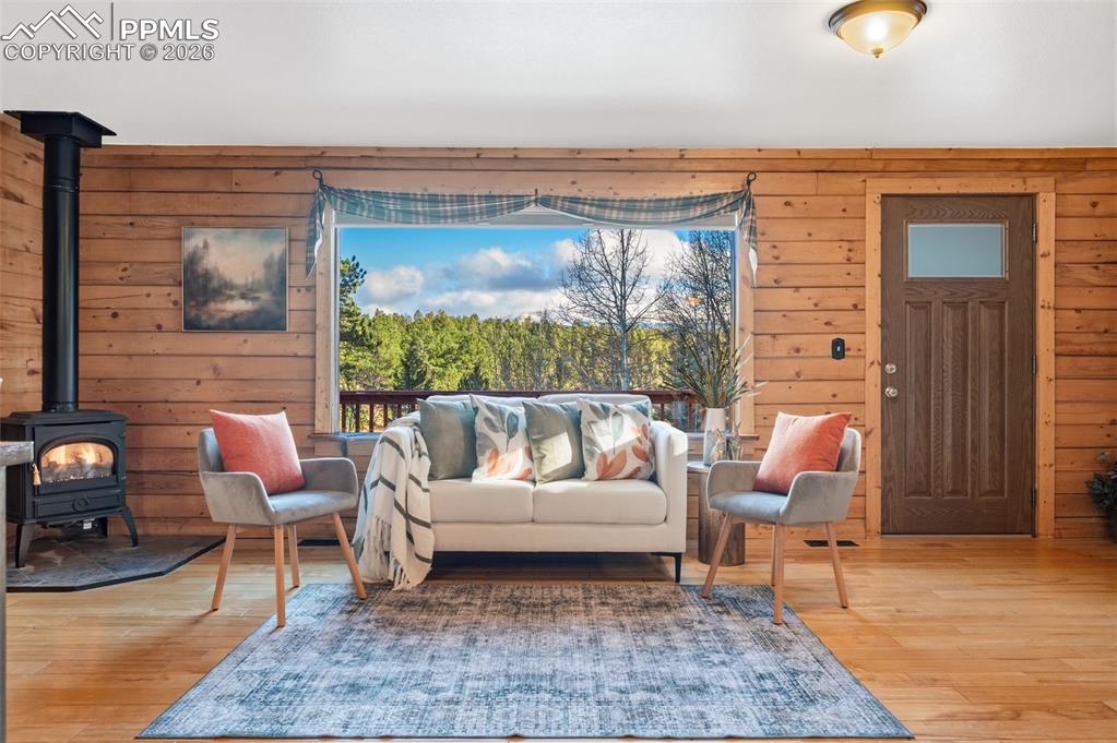 Image 5 of 41: Main level living room with walk out to deck