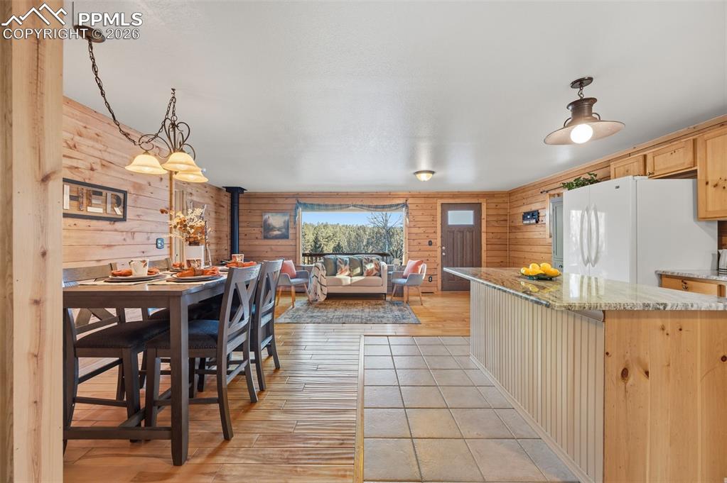 Image 7 of 41: Main level open concept living, dining and kitchen