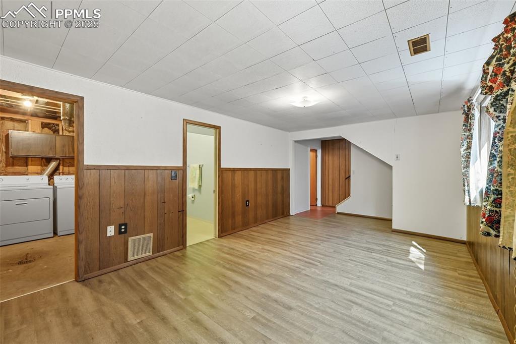 Image 13 of 29: Lower bonus room featuring new LVP floors