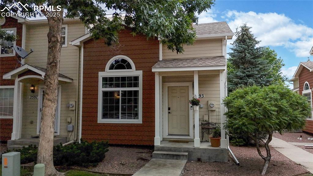 Caption: View of front of home with a shingled roof