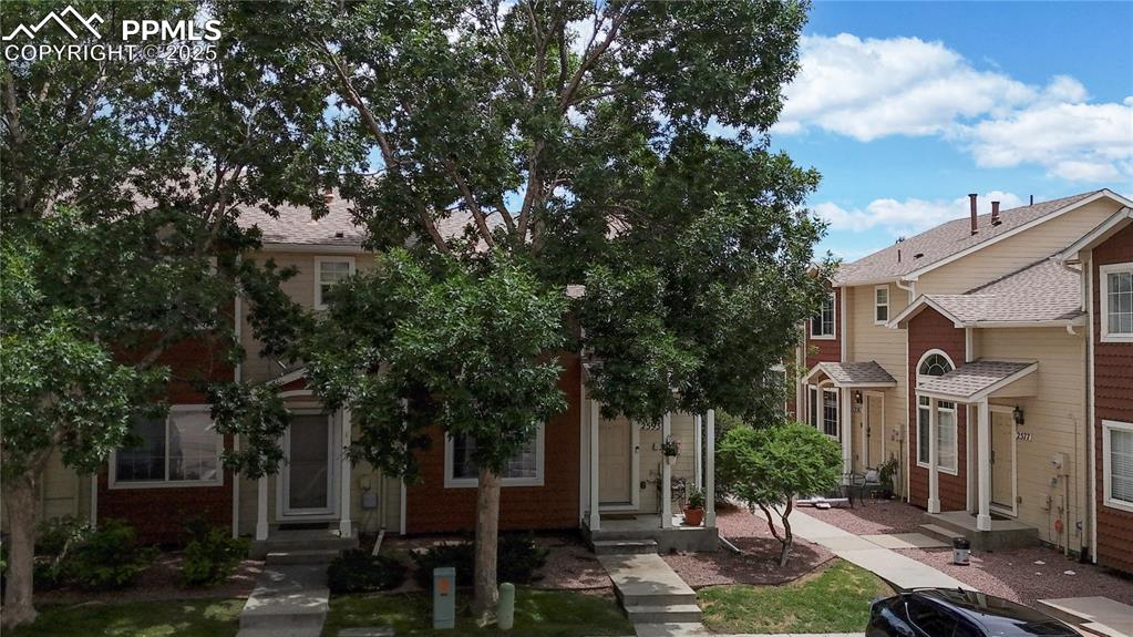 Image 31 of 37: View of front of house with entry steps