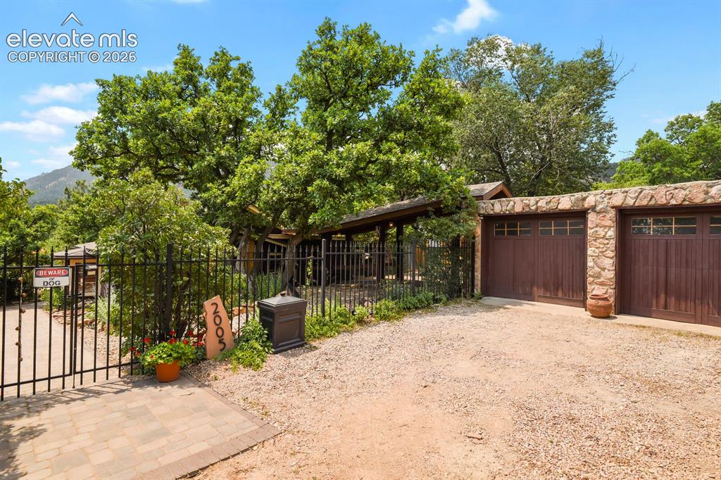 Image 47 of 50: Two car garage with additional driveway parking!