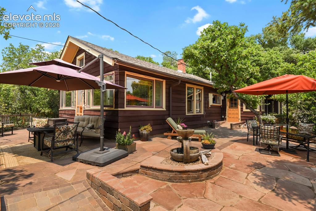 Image 5 of 50: Gorgeous patios surrounding the property