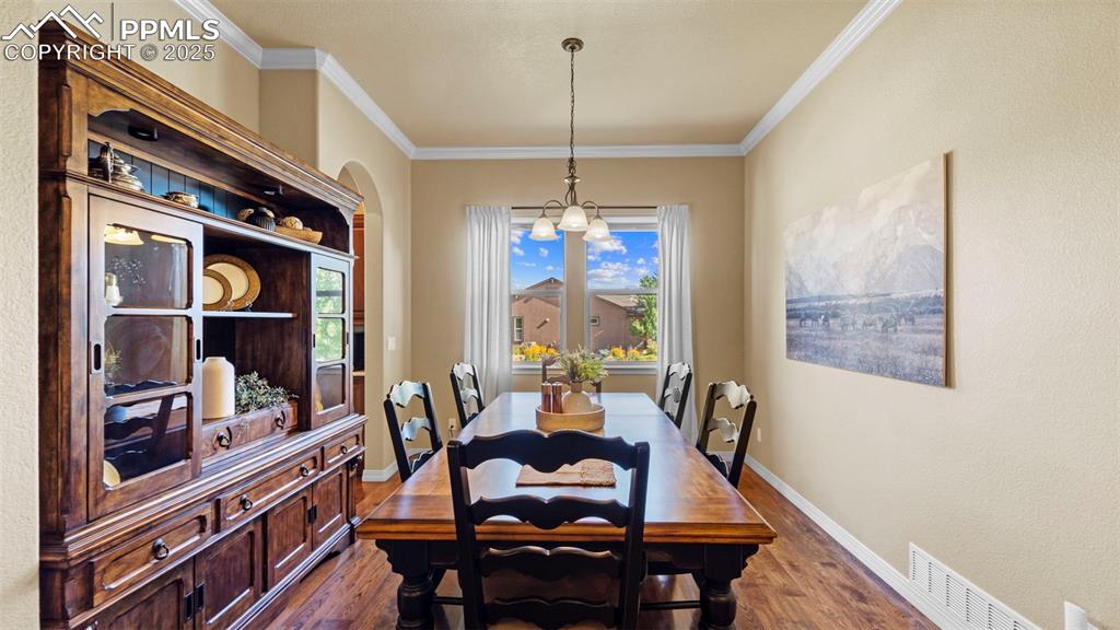 Image 12 of 48: Dining room with space for every holiday, birthday, and taco Tuesday.