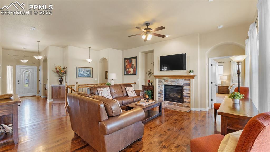 Image 15 of 48: Cozy living room shot that says, “grab a blanket and stay awhile.”