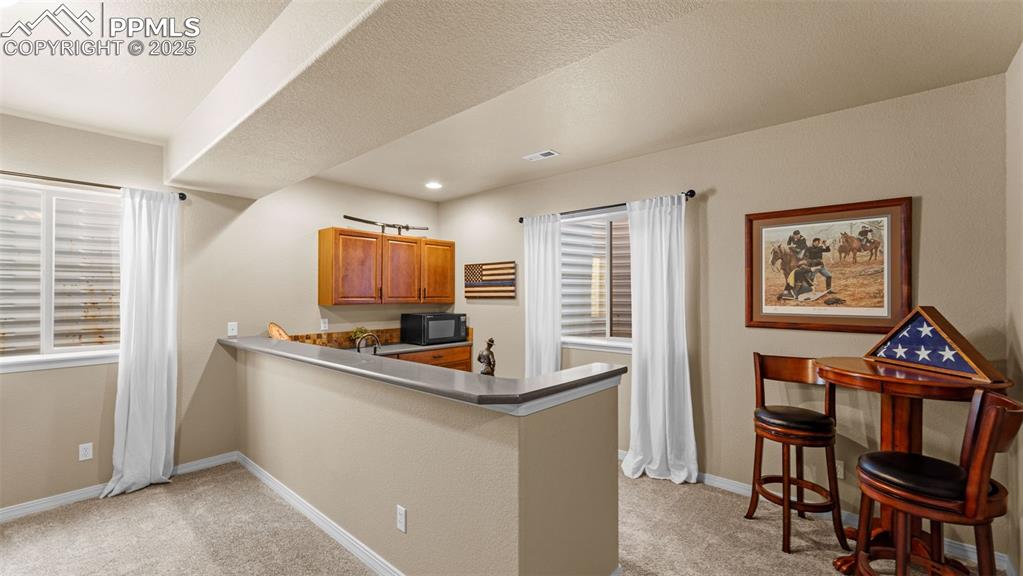 Image 29 of 48: Kitchen view that highlights the island of your dreams.