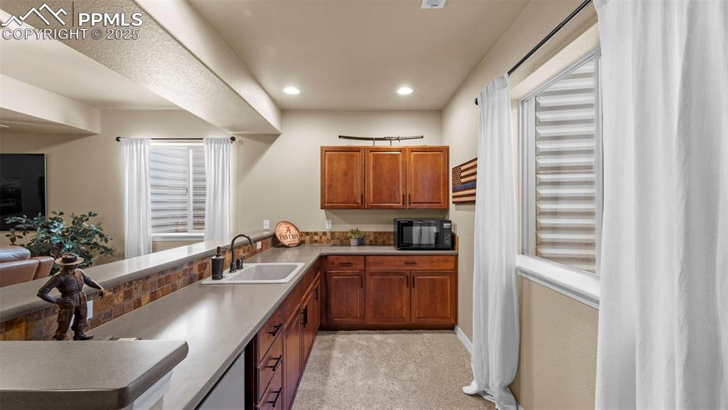Image 30 of 48: Kitchen detail showing off the craftsmanship of the cabinetry.
