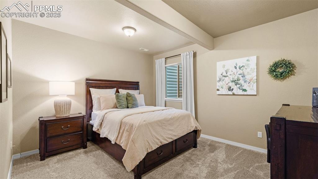 Image 35 of 48: Another bedroom that feels both stylish and serene.