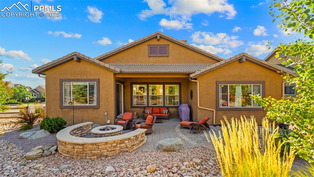 Image 37 of 48: Back view showing off the perfect balance of home and nature.