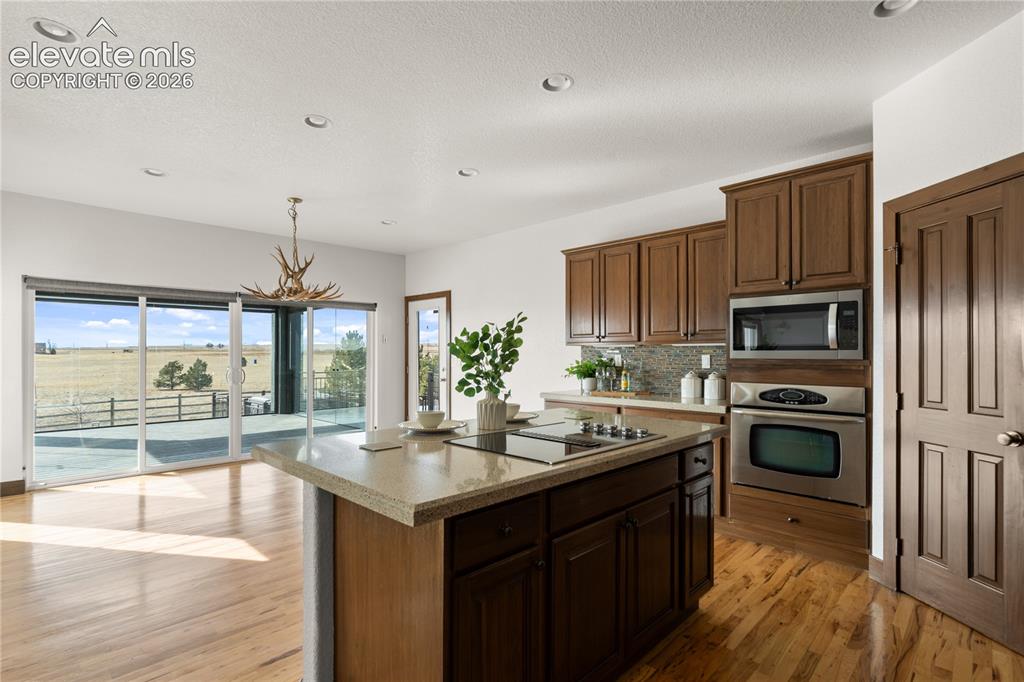 Image 18 of 40: You can open the sliders and experience the 4 seasons addition to your home