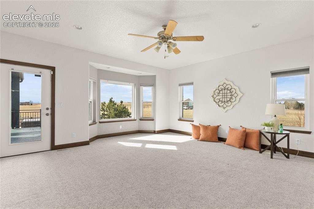 Image 20 of 40: The primary suite is on the main level - true main level living. It exits
