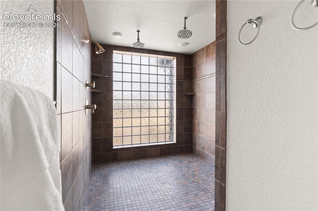 Image 24 of 40: The shower is straight out of a luxury spa!