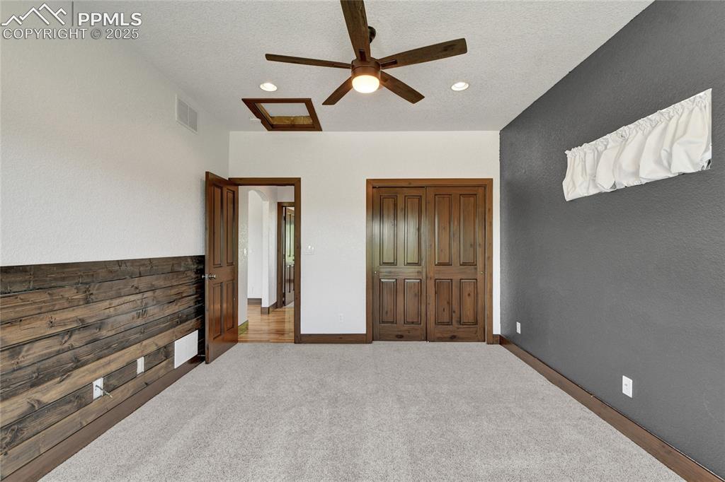 Image 26 of 40: Main level bedrooms are tough to come by and this home has 3 and an office!