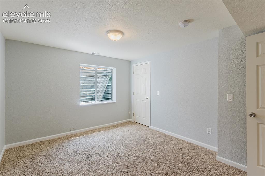 Image 17 of 46: Scond basement bedroom