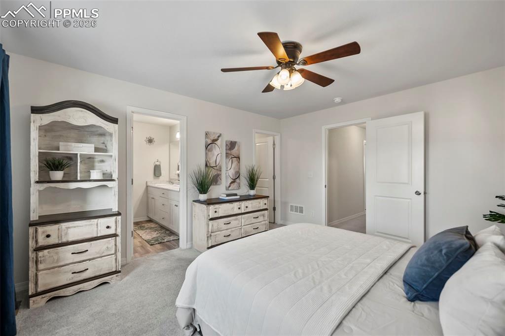 Image 13 of 22: HUGE PRIMARY BEDROOM WITH WALK-IN CLOSET AND EN-SUITE BATH