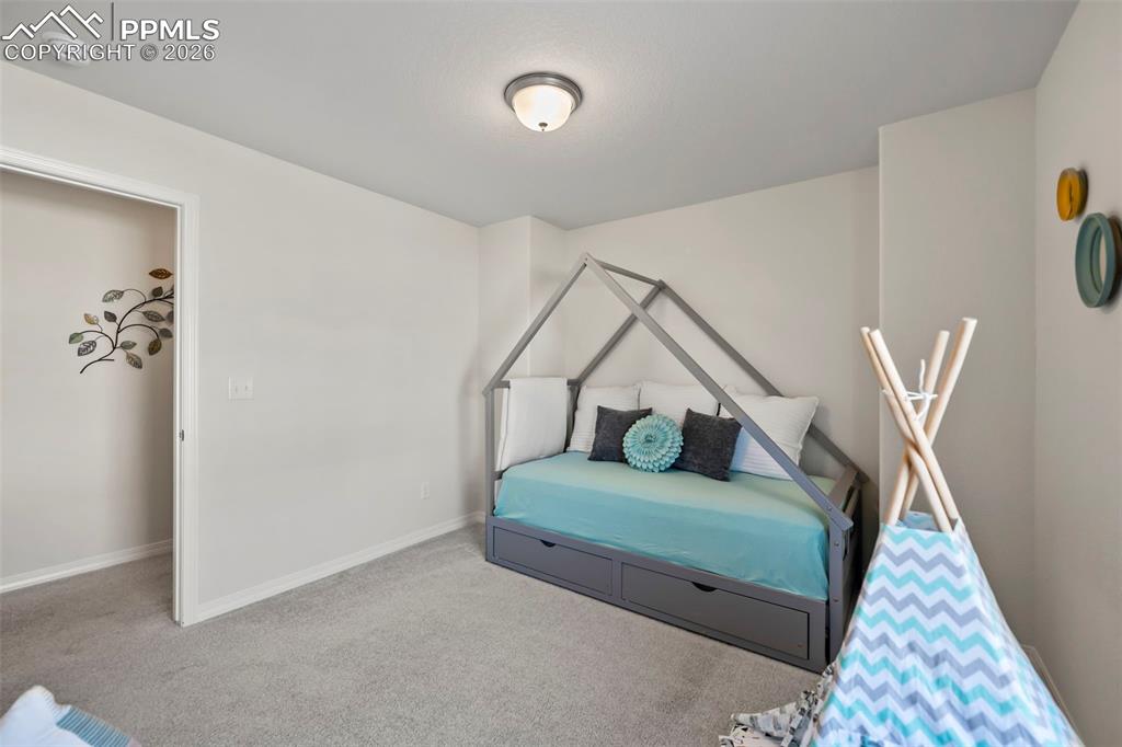 Image 18 of 22: 2ND UPPER BEDROOM WITH WALK-IN CLOSET