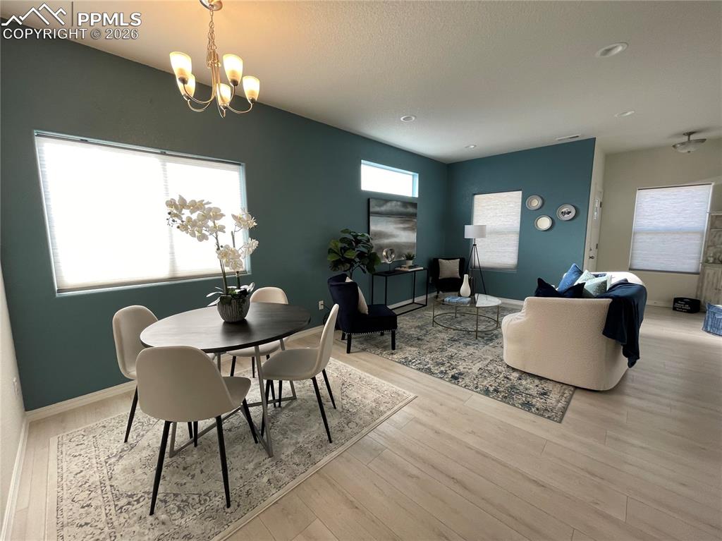 Image 7 of 22: DINING AND LIVINGROOM