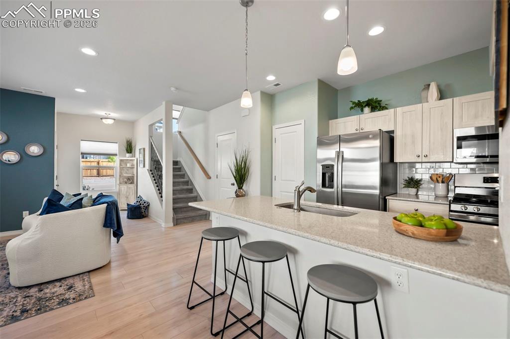 Image 8 of 22: BRIGHT AND SPACIOUS OPEN MAIN LEVEL