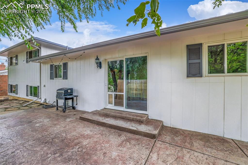 Image 42 of 50: Rear view of house featuring a patio area