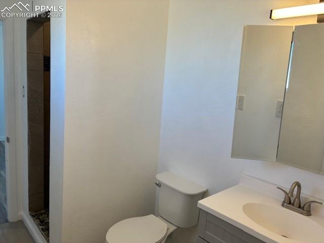 Image 13 of 36: Full bathroom with vanity and a stall shower