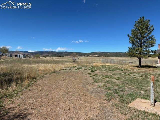 Image 36 of 36: View of yard featuring a view of rural / pastoral area and a mountain view