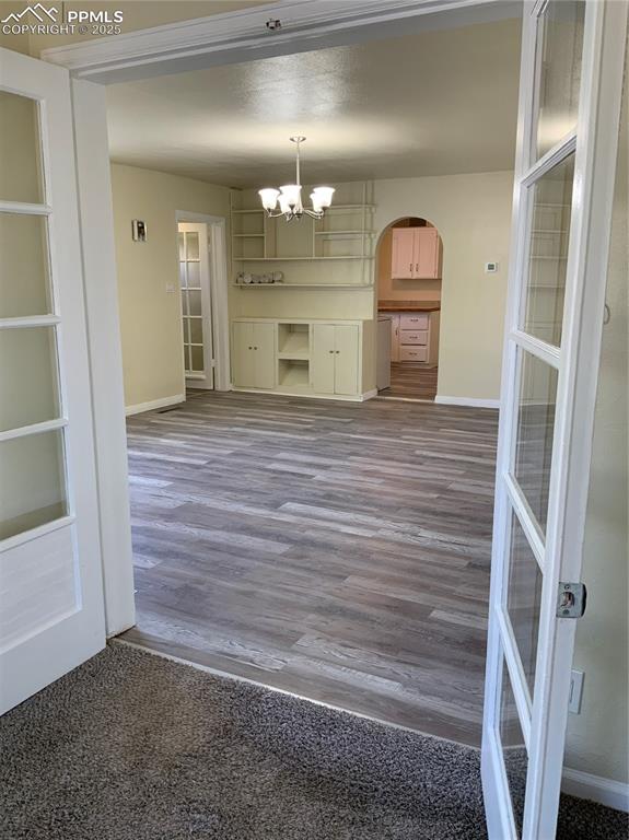 Image 11 of 39: View from office to living area